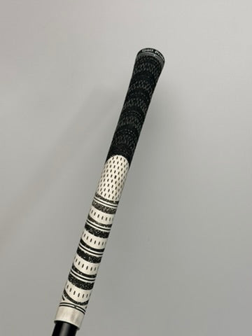 Golf Pride grip installed on the used TaylorMade Qi4D Max 9 wood