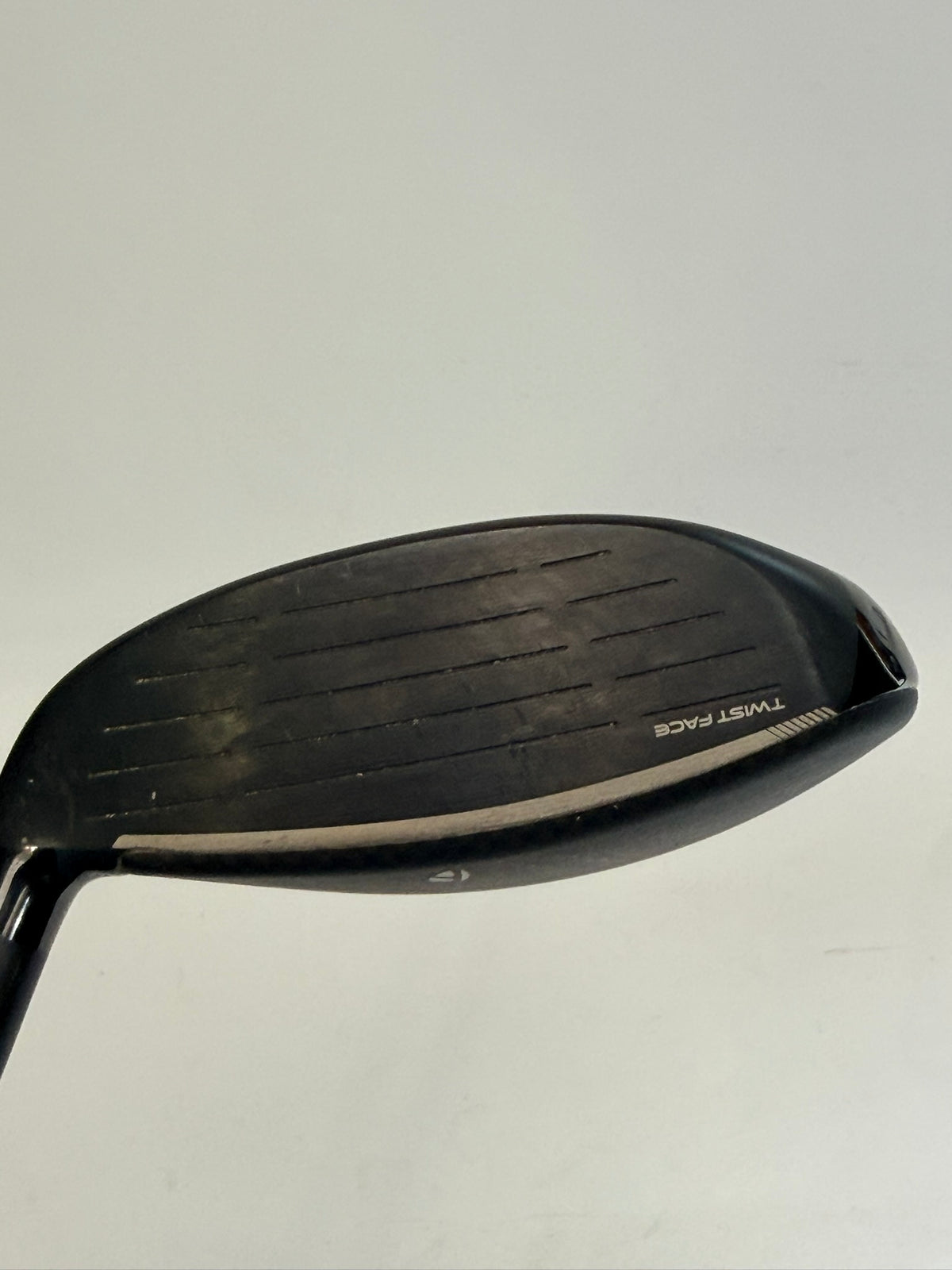 TaylorMade Qi4D Max right-handed 9 wood clubface showing used condition