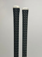 TaylorMade Qi35 Max Lite 7 hybrid - Two Golf Pride grips on available clubs, original photo