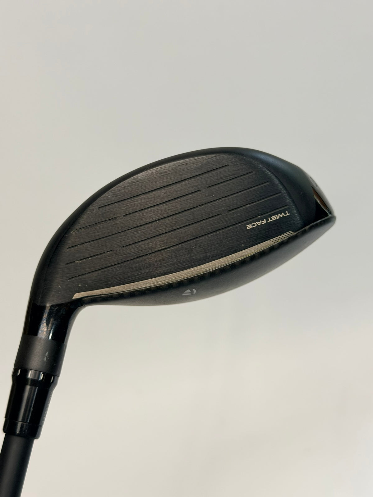 TaylorMade Qi4D Core right-handed 9 wood clubface showing used condition