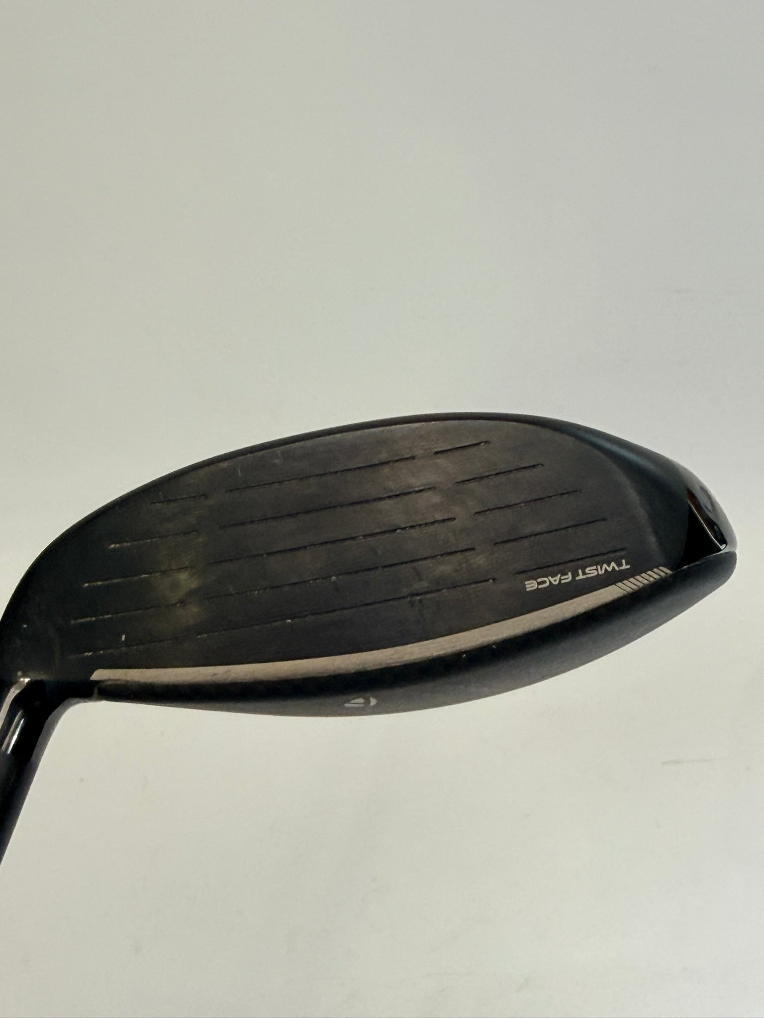 TaylorMade Qi4D Max right-handed 9 wood clubface showing used condition
